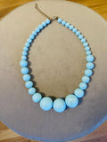 Collar bolas azul turquesa