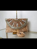 Clutch rafia conchas cauris